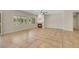 Inviting living room with a fireplace, tile floors, and plantation shutters at 2349 Orangeburg Pl, Henderson, NV 89044