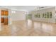 Open-concept living area with a large tile floor and many windows at 2349 Orangeburg Pl, Henderson, NV 89044