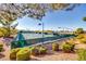 Well-maintained tennis courts surrounded by lush greenery and mature trees at 2349 Orangeburg Pl, Henderson, NV 89044