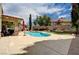 Large backyard with pool, patio, and mature trees, perfect for relaxation and entertaining at 3055 Whispering Crest Dr, Henderson, NV 89052