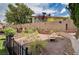 Scenic backyard with landscaping, charming decorations and decorative block wall for privacy at 3055 Whispering Crest Dr, Henderson, NV 89052