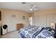 Comfortable bedroom featuring a ceiling fan, large closet, and plenty of natural light at 3055 Whispering Crest Dr, Henderson, NV 89052