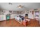 Bonus room boasts a large display of collectables, laminate floors, and functional furniture at 3055 Whispering Crest Dr, Henderson, NV 89052