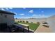 Well-maintained backyard with patio seating and a view of the mountains at 314 W Winston Ln, Indian Springs, NV 89018