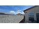 Backyard view highlighting the block wall and surrounding mountain landscape at 314 W Winston Ln, Indian Springs, NV 89018