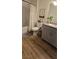 Updated bathroom with granite counters, modern vanity, and shower-tub combination at 314 W Winston Ln, Indian Springs, NV 89018