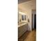 Bathroom featuring double sinks, modern fixtures, and neutral color scheme in a new home at 314 W Winston Ln, Indian Springs, NV 89018