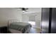 Cozy bedroom with natural light and ceiling fan; offers a relaxing space at 314 W Winston Ln, Indian Springs, NV 89018