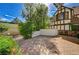 Spacious paved area surrounded by lush landscaping and privacy walls at 3141 E Katie Ave, Las Vegas, NV 89121