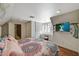Bright bedroom featuring a workstation by the window and unique closet access at 3141 E Katie Ave, Las Vegas, NV 89121