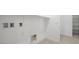 Bright laundry room with white walls, tile floors, and utility connections, with storage space at 350 Tigullio Ave, Henderson, NV 89011