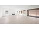 Large living room with tile floors and fireplace at 350 Tigullio Ave, Henderson, NV 89011