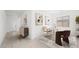 Well-lit home office with modern furniture, neutral walls, and hardwood floors, perfect for remote work at 350 Tigullio Ave, Henderson, NV 89011