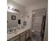 Well-lit bathroom with a vanity, spacious mirror, and a shower-tub combination for ultimate relaxation at 3550 Bay Sands Dr # 2063, Laughlin, NV 89029
