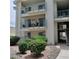 Multi-story building with balconies and lush landscaping at 3550 Bay Sands Dr # 2063, Laughlin, NV 89029