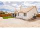 Backyard featuring partial fencing, a small patch of grass, and a blank canvas at 3630 Daisy Field Dr, North Las Vegas, NV 89032