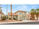 Charming two-story home featuring a well-maintained front yard, tile roof, and attached two-car garage at 3709 Misty Falls St, Las Vegas, NV 89129