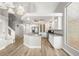Open-concept kitchen with granite counters, stainless appliances, and ample natural light is great for entertaining at 3709 Misty Falls St, Las Vegas, NV 89129