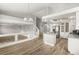 Open-concept living space featuring dining area, kitchen, and views of the upstairs loft, perfect for Gathering gatherings at 3709 Misty Falls St, Las Vegas, NV 89129