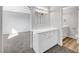 Bathroom with white vanity and a mirror with vanity lighting above at 3791 El Camino Rd, Las Vegas, NV 89103