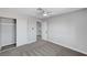 Bedroom with carpet, closet, and an entrance to the stairwell at 3791 El Camino Rd, Las Vegas, NV 89103