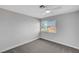 Small bedroom featuring a ceiling fan, neutral paint and a large window at 3791 El Camino Rd, Las Vegas, NV 89103