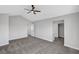 Spacious bedroom features a ceiling fan, neutral paint and trim, and closet at 3791 El Camino Rd, Las Vegas, NV 89103