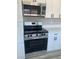New stainless steel appliances, countertops, and hardware accent the ample storage in this remodeled kitchen at 3791 El Camino Rd, Las Vegas, NV 89103