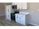 New stainless steel appliances, countertops, and hardware accent the ample storage in this remodeled kitchen at 3791 El Camino Rd, Las Vegas, NV 89103