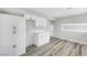 Open kitchen design with updated white cabinets, hardware, and ample counter space at 3791 El Camino Rd, Las Vegas, NV 89103