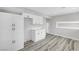 Open kitchen design with updated white cabinets, hardware, and ample counter space at 3791 El Camino Rd, Las Vegas, NV 89103