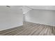 Bright living room featuring vaulted ceilings and wood flooring at 3791 El Camino Rd, Las Vegas, NV 89103
