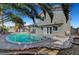 Inviting backyard pool with a spacious concrete patio, perfect for outdoor entertaining and relaxation at 3791 El Camino Rd, Las Vegas, NV 89103
