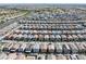 Extensive aerial view of a vibrant community showcasing rows of homes, streets, and common areas at 3808 Seyfert Ave, North Las Vegas, NV 89084