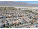 Expansive aerial view of a residential community with mountain backdrop at 3808 Seyfert Ave, North Las Vegas, NV 89084