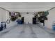 Spacious three car garage with overhead storage racks and ample space for storage at 3808 Seyfert Ave, North Las Vegas, NV 89084