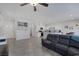 Open concept living space with combined kitchen, dining area, and a living room sectional sofa at 3808 Seyfert Ave, North Las Vegas, NV 89084