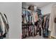 Spacious walk-in closet features ample hanging space and built-in shelving for storage at 3808 Seyfert Ave, North Las Vegas, NV 89084
