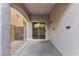 Covered back patio with sliding glass door to the interior living space at 4517 Lime Straight Dr, Las Vegas, NV 89115