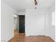 Bedroom with closet and access to laundry room with a modern ceiling fan at 4517 Lime Straight Dr, Las Vegas, NV 89115
