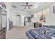 Large bedroom featuring a ceiling fan, carpet, and ample space at 465 Indigo Springs St, Henderson, NV 89014