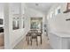 Open-concept dining area with natural light, views of the backyard, and access to the kitchen at 465 Indigo Springs St, Henderson, NV 89014