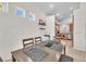 Cozy dining area adjacent to the kitchen with views of the outdoor space and natural light at 465 Indigo Springs St, Henderson, NV 89014