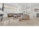 Spacious living room with comfortable seating and large windows at 465 Indigo Springs St, Henderson, NV 89014