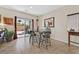 Cozy dining area features patio access and lots of natural light at 5226 Lignum Ave # 1, Pahrump, NV 89061