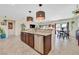 Well-lit kitchen with island, great for meal prep and casual dining at 5226 Lignum Ave # 1, Pahrump, NV 89061