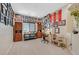 Home office or den with built in shelving, a desk, and carpet floors at 5226 Lignum Ave # 1, Pahrump, NV 89061