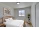 Bedroom with a comfortable bed and a window that lets in plenty of natural light at 5273 Manassas Ave, Las Vegas, NV 89122
