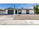 Charming single story home with xeriscaped front yard and integrated garage at 5273 Manassas Ave, Las Vegas, NV 89122