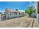 Expansive backyard provides ample room for landscaping and outdoor enjoyment, surrounded by secure fencing at 544 Rancho Del Sol Way, North Las Vegas, NV 89031